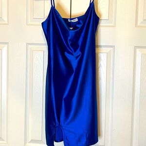 Mini cowl neck stretch dress with right side slit.